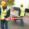rectractable barriers for vehicle pits