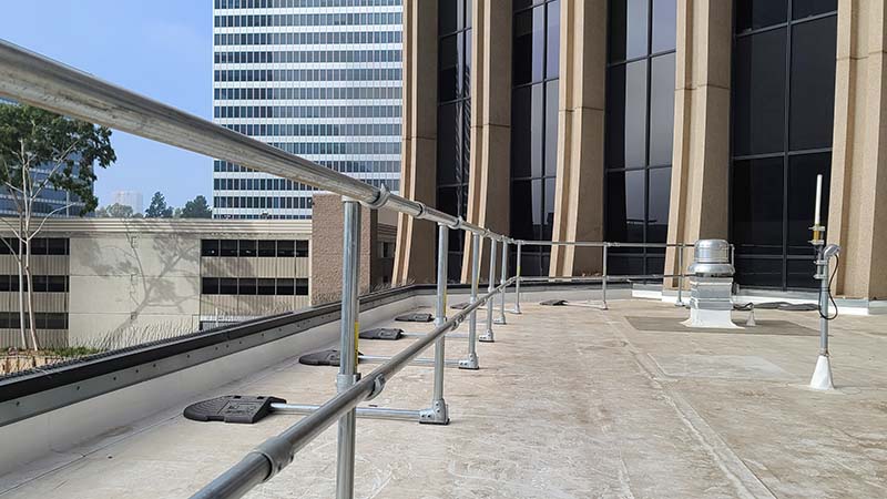 Non penetrating rooftop railing fall protection