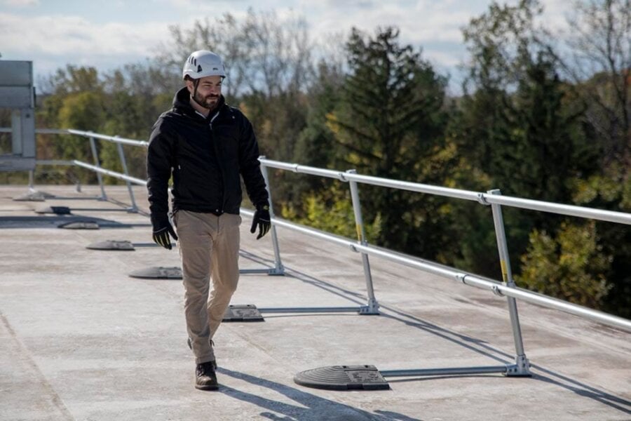 Rooftop Guardrail Protecting Worker