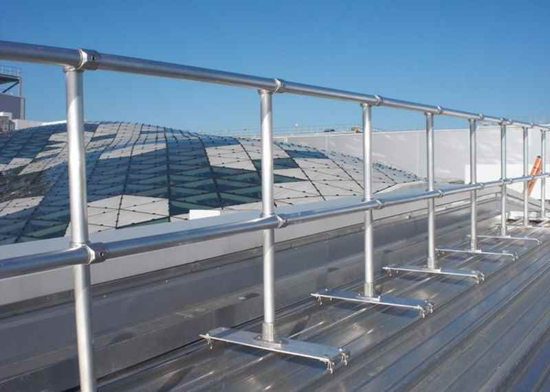 Guard rail on standing seam metal roof
