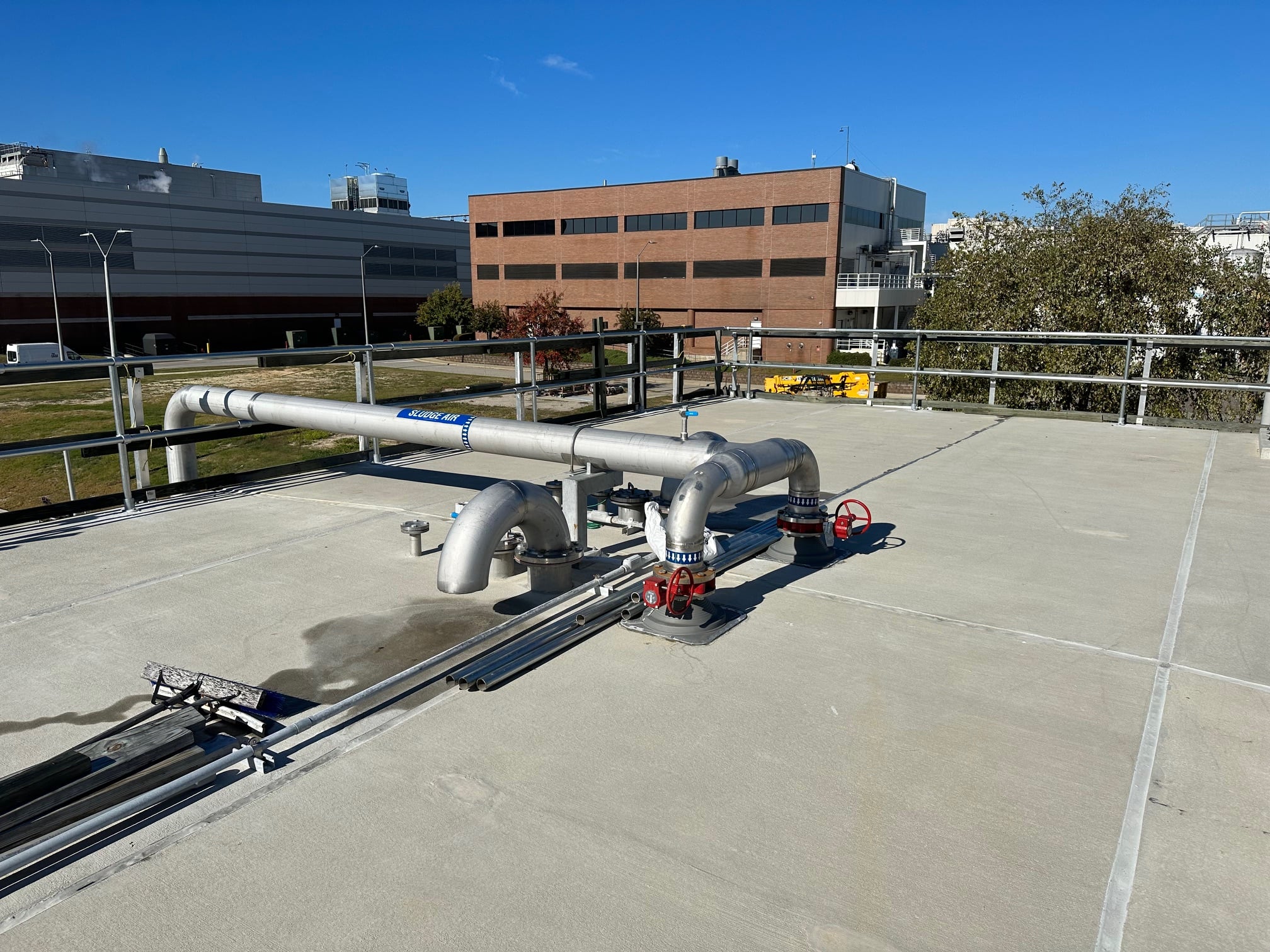 Wastewater treatment facility guardrail